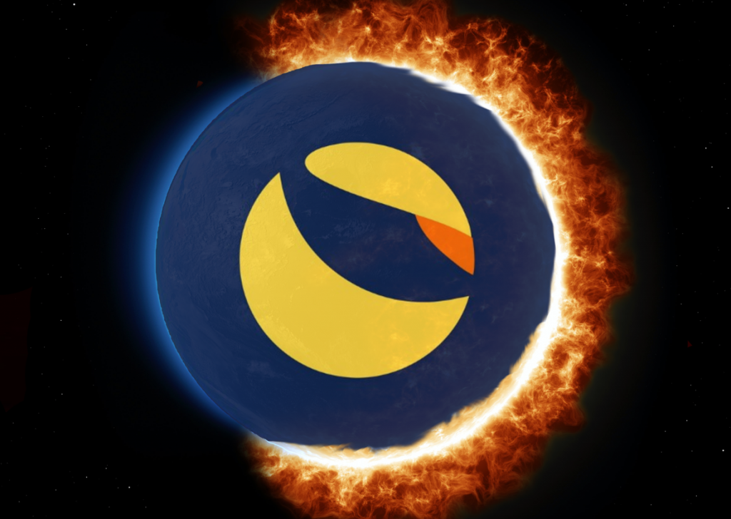 Image showing the Terra company logo  -made up of a blue sphere with yellow and orange symbol resembling an eye residing within the blue sphere- being engulfed by flames.