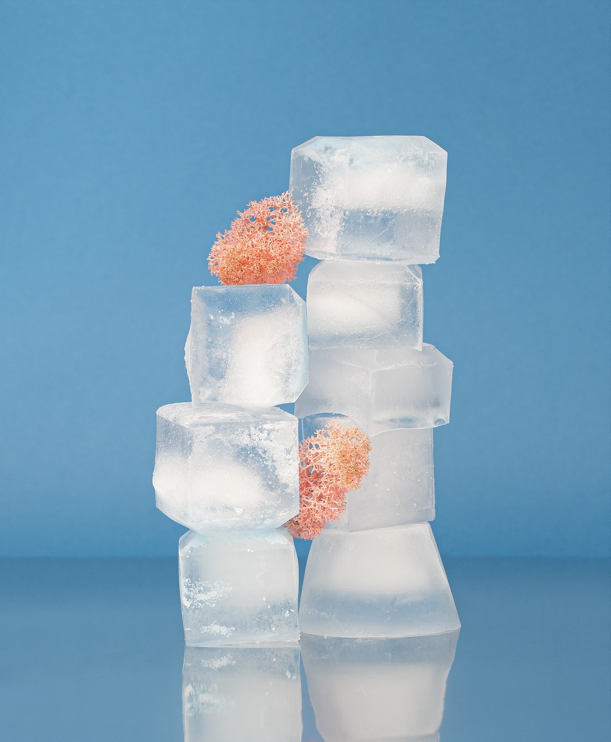 Ice cubes standing on top of each other.